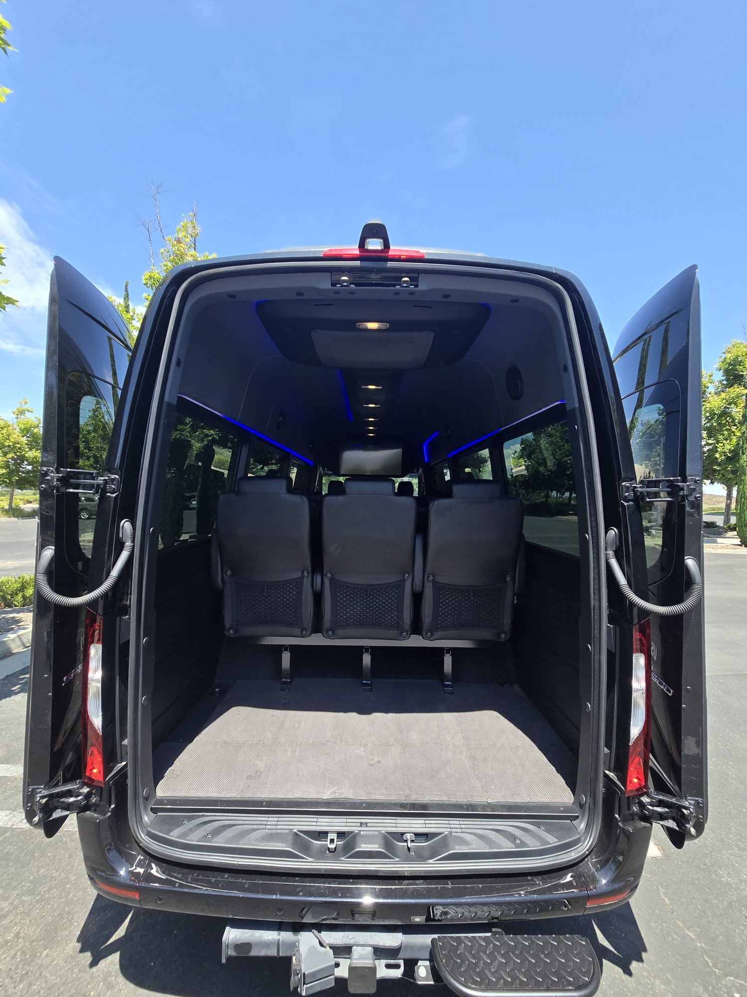 Executive Sprinter with rear doors open, cabin entrance